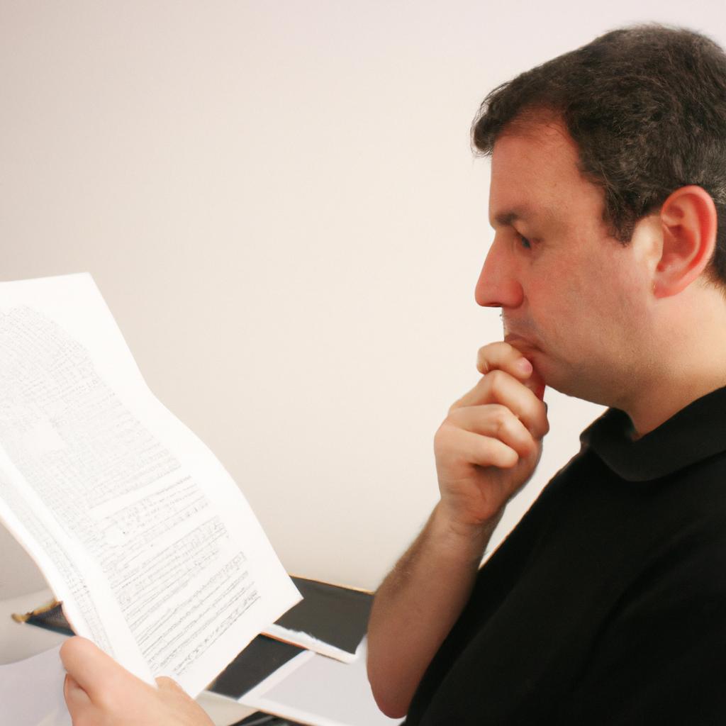 Man reading historical documents, researching